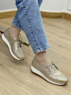 Golden Glow Sneakers with Striking White Stripe