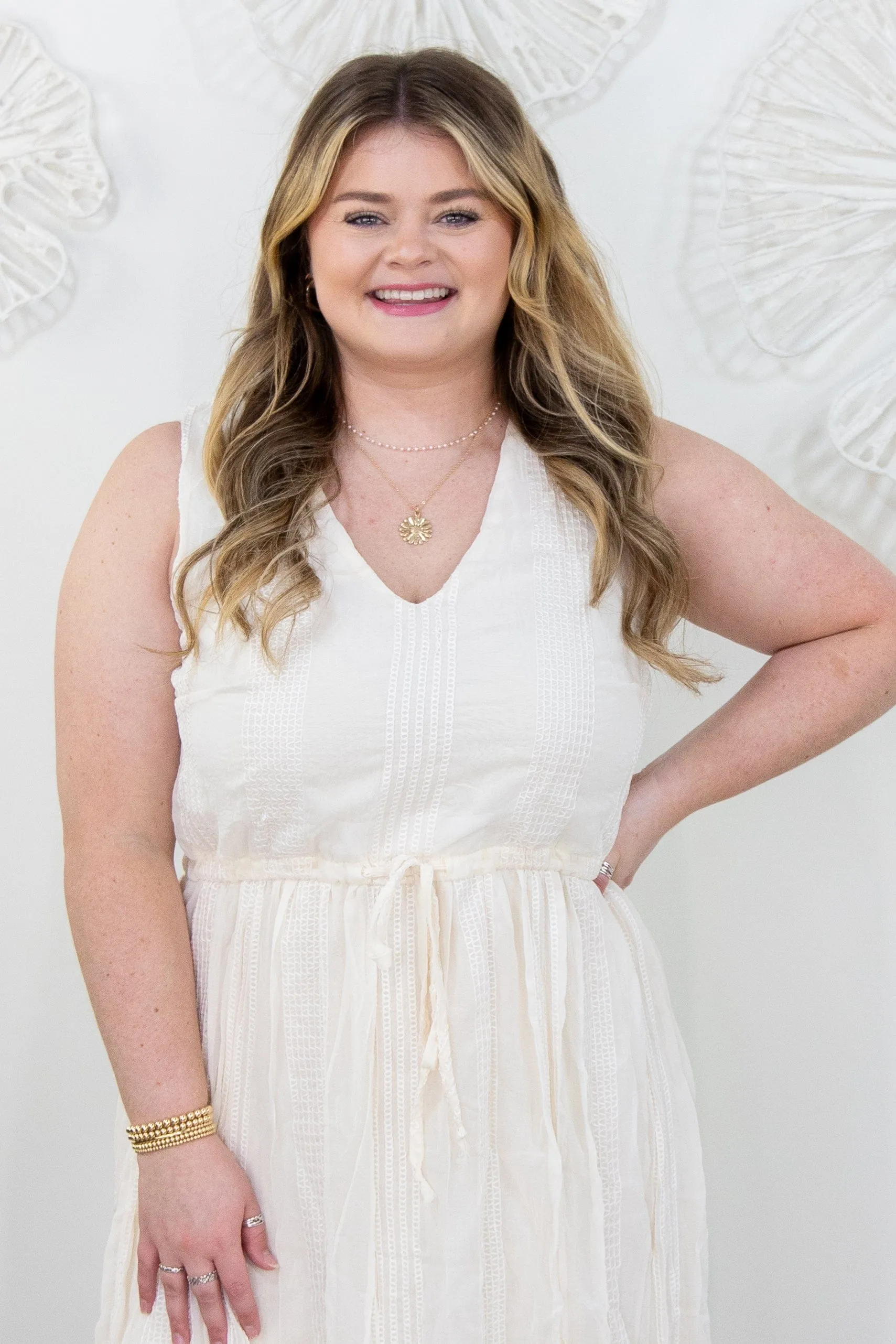 Ivory Sleeveless Pleated Dress