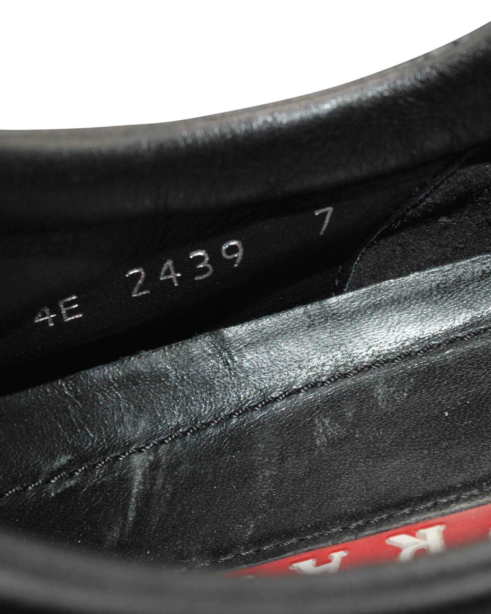 Prada Low Top Sneakers in Black Leather